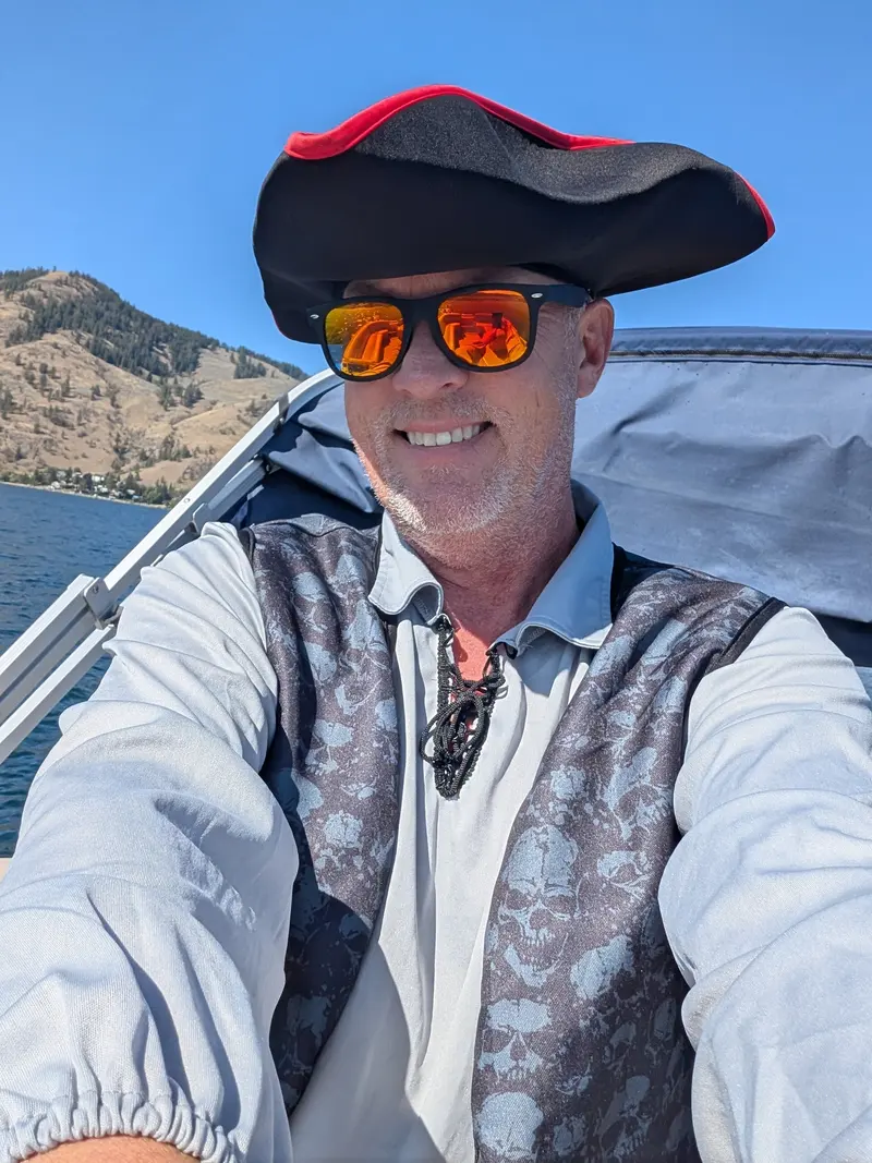Sean Phillips in pirate costume on the deck of the MV Okanagan on Okanagan Lake